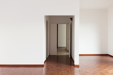 interior empty apartment, white walls parquet floor