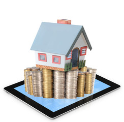 Mortgage concept by money house from coins