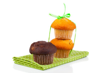 sweet muffins on white background..