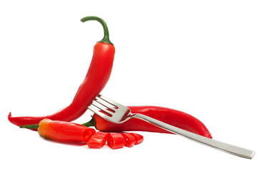 Fototapeta na wymiar fork holding hot chili pepper