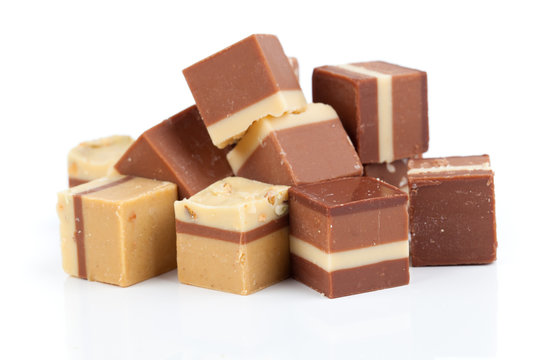 Nougat praline, delicious mix of nougat and almond creme, on whi