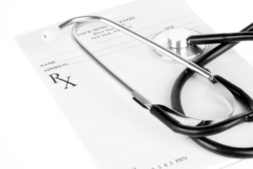 Stethoscope and empty prescription isolated