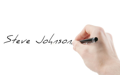 Signature with a hand holding a pen isolated on white