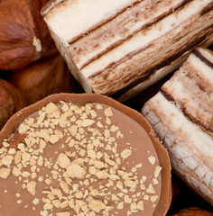Closeup of coffee beans, cinnamon and nuts