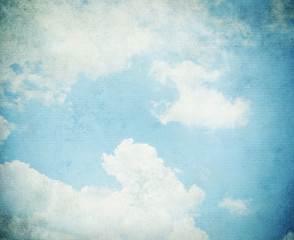 Clouds with blue skySky, fog, and clouds on a textured, vintage