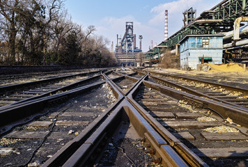 Fototapeta premium Rusted railway and abandoned steel works in Beijing