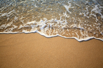 Soft wave of the sea on the sandy beach