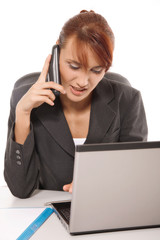 Businesswoman talking on telephone