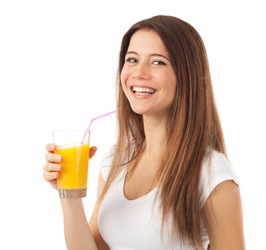 Beautiful woman drinking orange juice