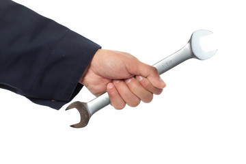 Hand of auto mechanic with wrench.