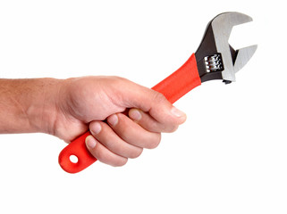 Hand of auto mechanic with wrench.