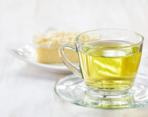 Cup of herbal tea and fresh cake
