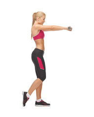 Fototapeta premium young sporty woman with light dumbbells