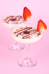 Fruit smoothies on pink background