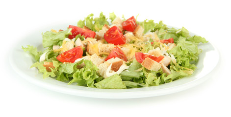 Caesar salad on white plate, isolated on white