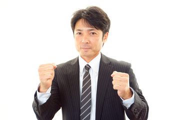 ガッツポーズのビジネスマン