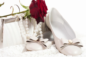 White shoes and bag with pearls beads and rose