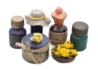 Small group of medical bottles with flowers