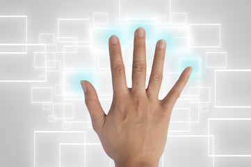 hand pushing a button on a touch screen interface