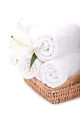 Beautiful lilly on towels rolls