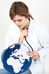 doctor woman examine world globe with her stethoscope isolated o