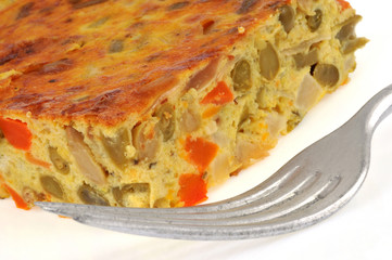 Un part de flan de macédoine de légumes