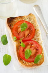 toast with tomato and oregano