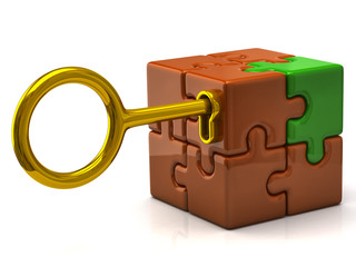 Orange puzzle cube with golden key.