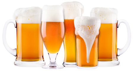 Frosty fresh beer collection with foam isolated