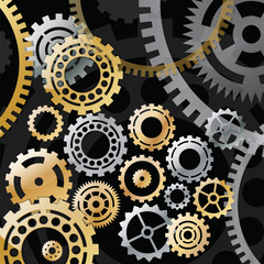 Gold and silver gears on a black background