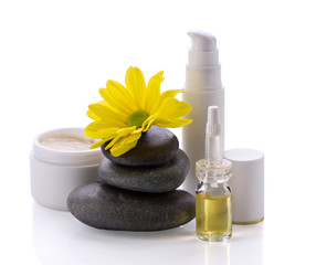 spa accessories, cosmetic products and flower