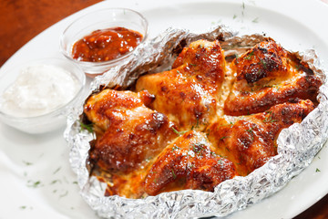 Chicken wings with sauce