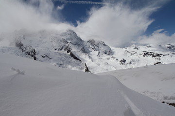 Snow mountains with flow cloud on Matterhorn