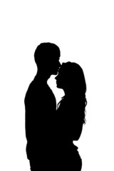 Silhouette of a young couple in love.