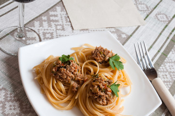 Italian pasta with beef in tomato sauce