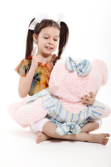 Little Girl And Teddy Bear on white background