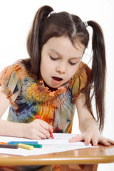 Naklejka premium Little girl drawing on white background