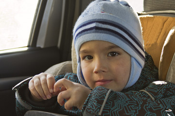 little boy in the car