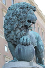 Naklejka premium Stone sculpture of a royal lion in Stockholm
