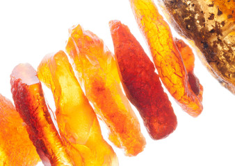 The raw amber on white close up