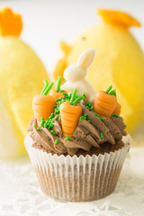 Easter cupcake with rabbit and carrots decoration