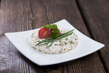 Rice Cake with topping on a plate