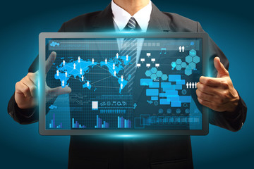 Hand pushing a button on a touch screen interface