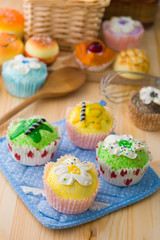 cup cakes with a lot of bread pastry background