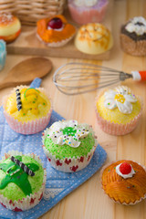 cup cakes with a lot of bread pastry background