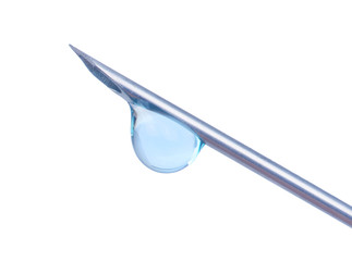 A drop on a needle white isolation