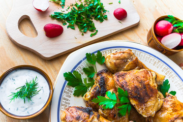 Baked Chicken legs board table wooden meat food roast grilled