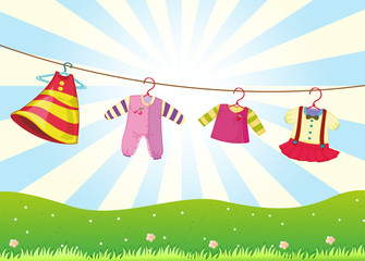 Fototapeta na wymiar Hanging baby clothes in the hill