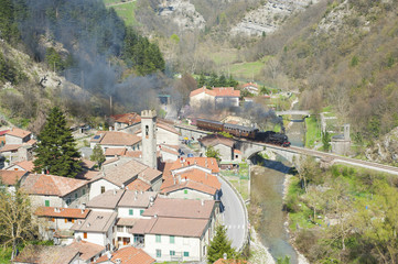 Italian village and little steam train