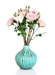 Beautiful pink and white roses in vase isolated on white